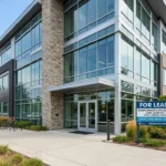 : Commercial building available for rent with a for lease sign posted outside